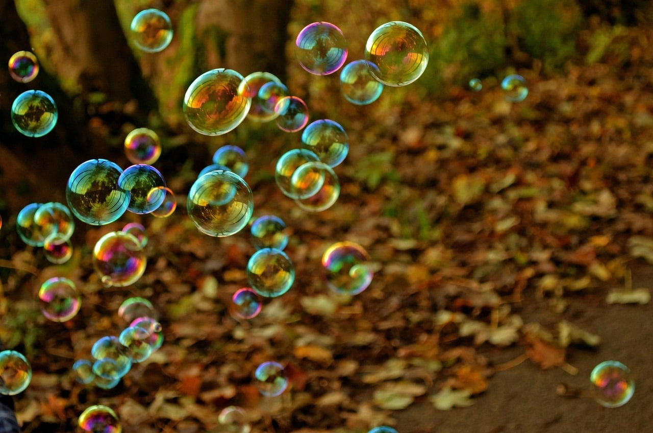 Floating bubbles representing scattered disconnected marketing tactics without strategic cohesion for growing businesses
